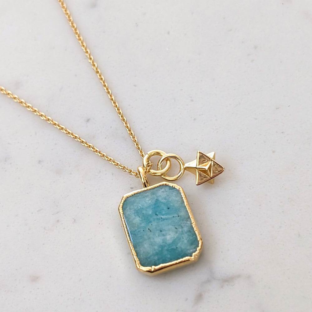 An 18 carat gold plated rectangular slice pendant with amazonite gemstone pendant necklace