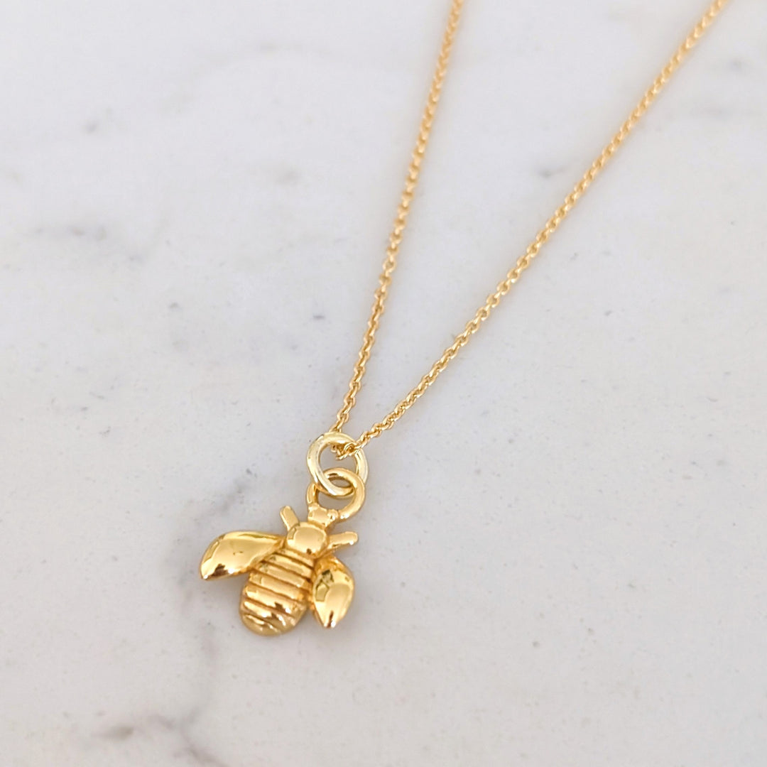 Gold plated bee charm pendant necklace