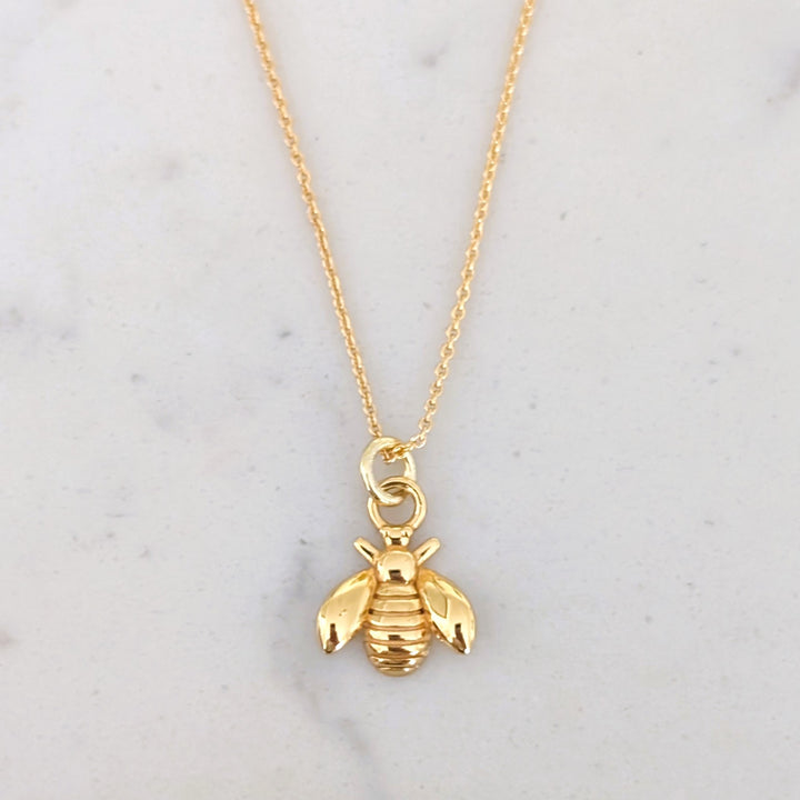 Gold plated bee charm pendant necklace