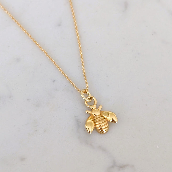 Gold plated bee charm pendant necklace