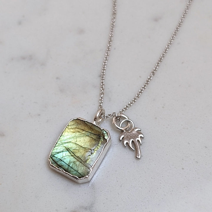 sterling silver labradorite rectangular pendant necklace and palm tree charm.