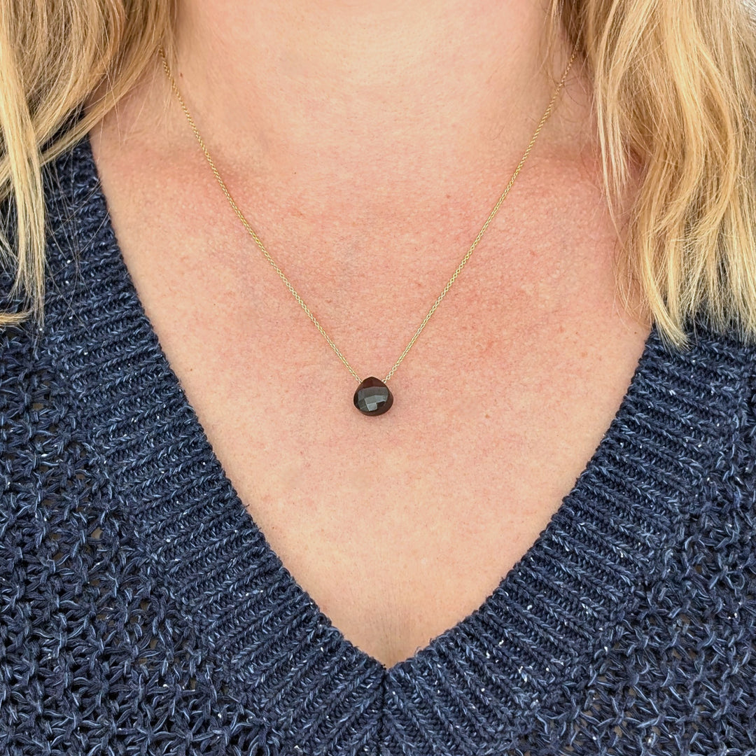 garnet January birthstone necklace on gold chain 