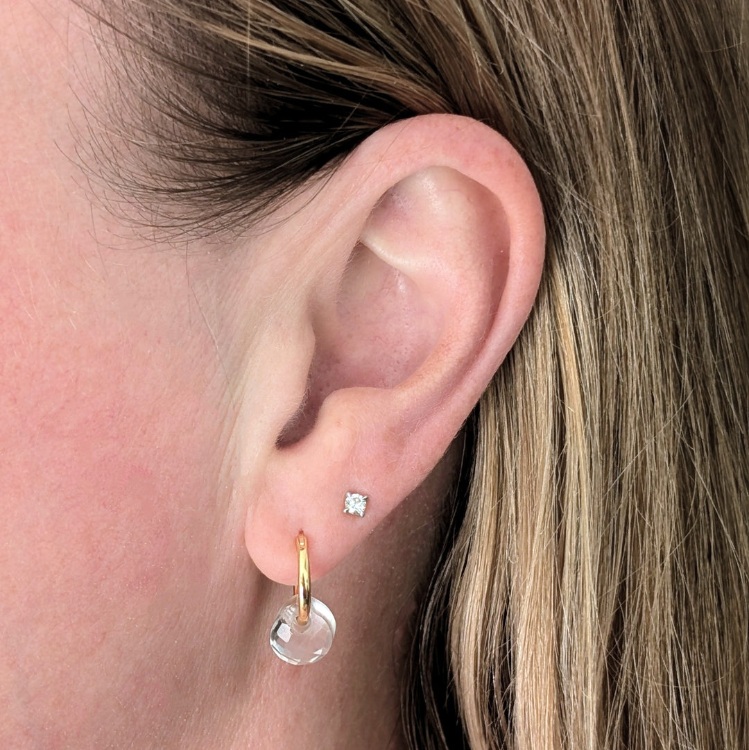 Gold hoop earrings with clear quartz faceted gemstone charms