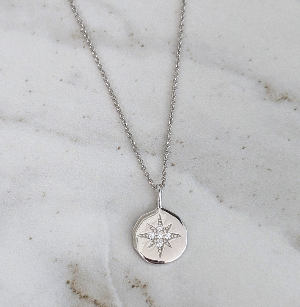 sterling silver starburst disc necklace