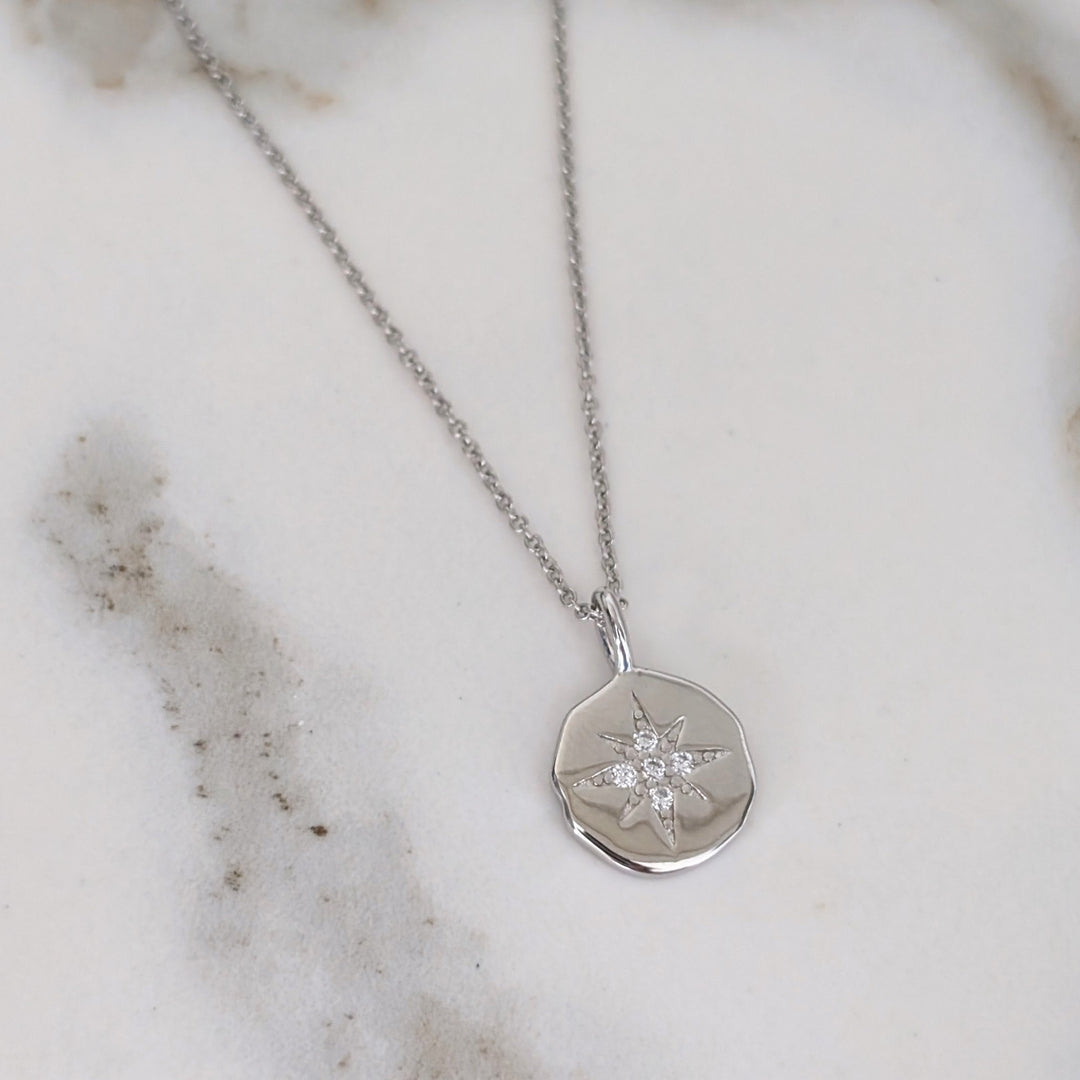 sterling silver starburst disc necklace