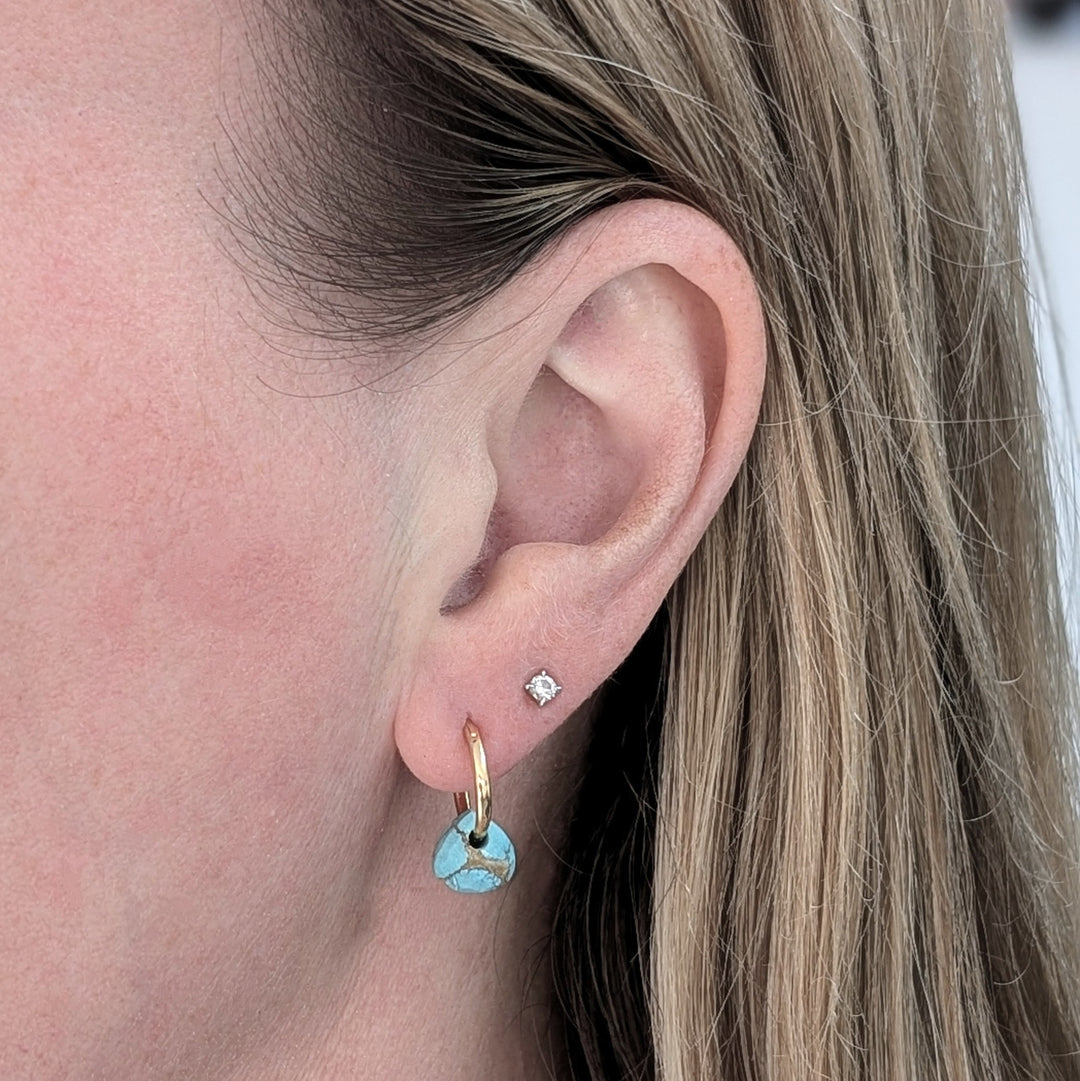gold earring hoops with turquoise faceted teardrop December birthstone earring charms