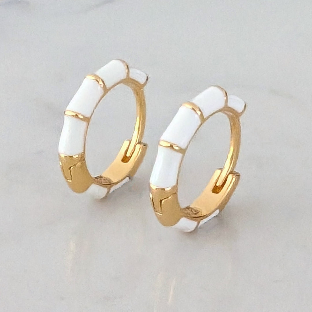 gold and white enamel huggie hoop earrings