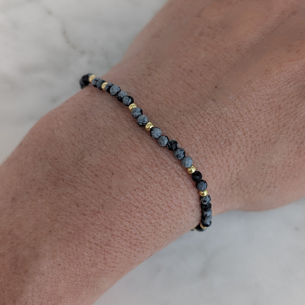 snowflake obsidian gemstone and gold bead bracelet 