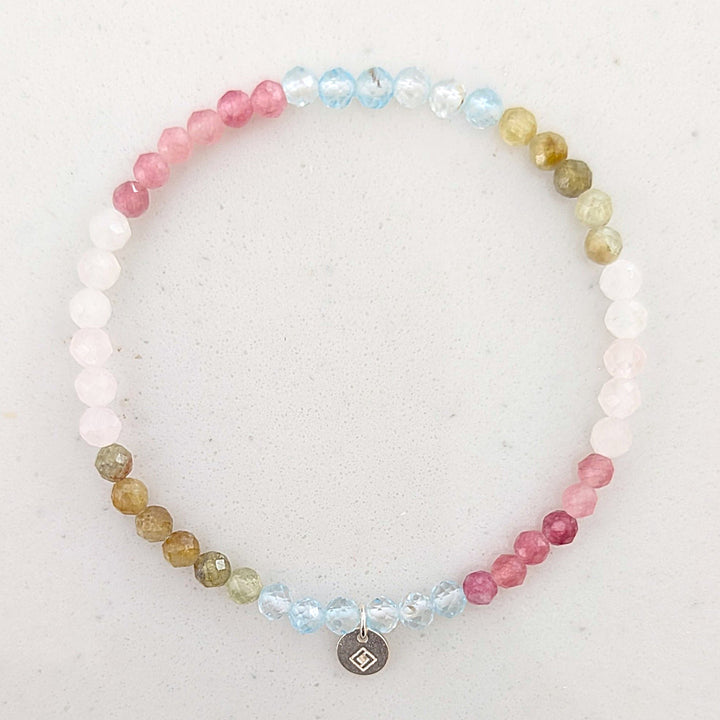 rose quartz, pink tourmaline, blue topaz and peridot friendship gemstone bracelet 