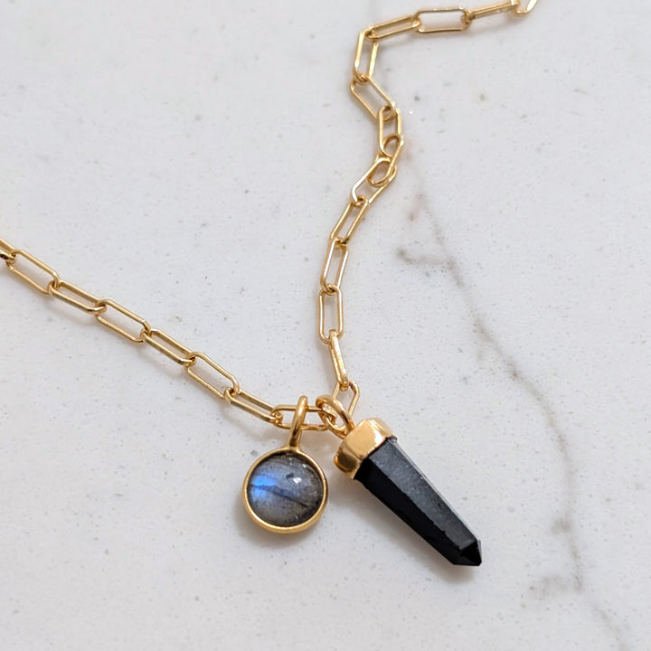 gold paperclip necklace with black tourmaline gemstone point pendant and labradorite charm