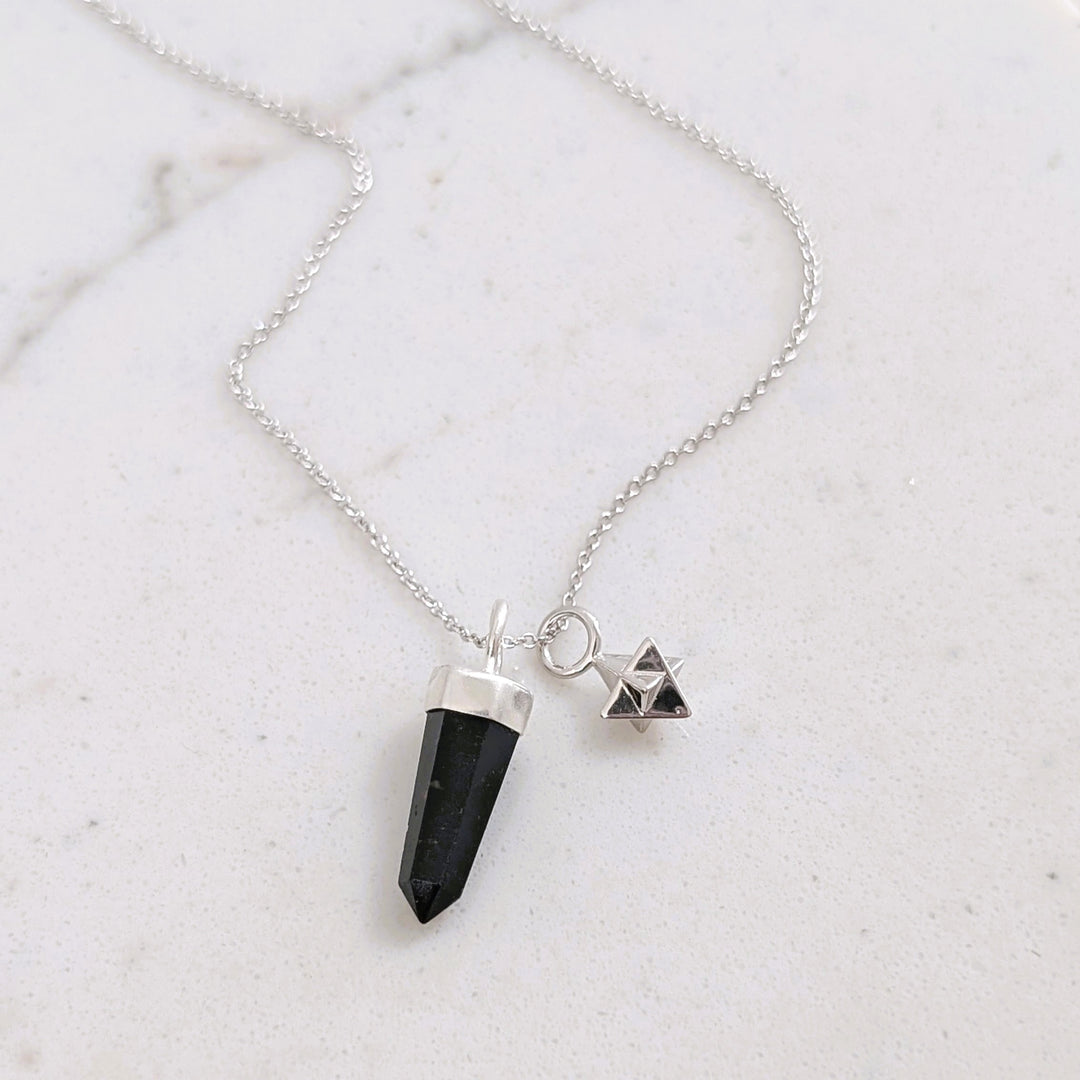 sterling silver black tourmaline spike gemstone necklace with tetrahedron star charm