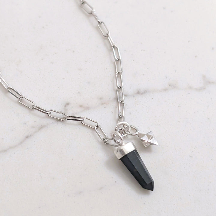 sterling silver black tourmaline spike gemstone necklace and silver tetrahedron charm 