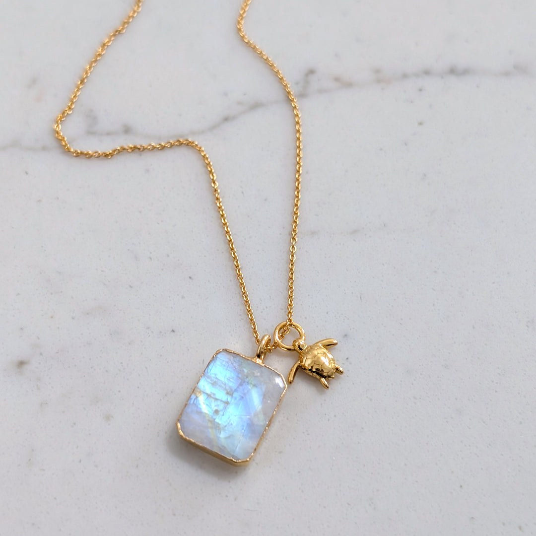 gold plated rectangular moonstone and gold charm pendant necklace 