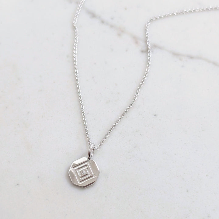 Sterling silver necklace with Lapis London disc charm pendant
