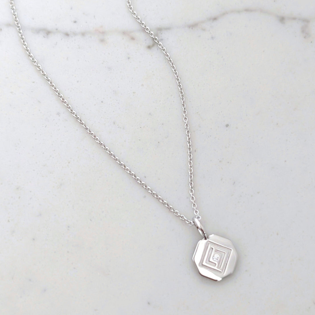 Sterling silver necklace with Lapis London disc charm pendant