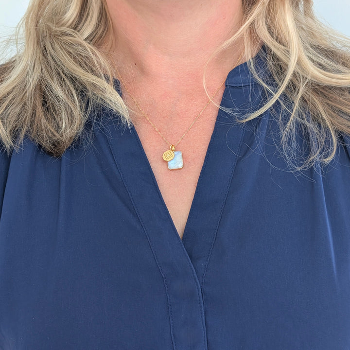 gold plated rectangular moonstone and gold charm pendant necklace 