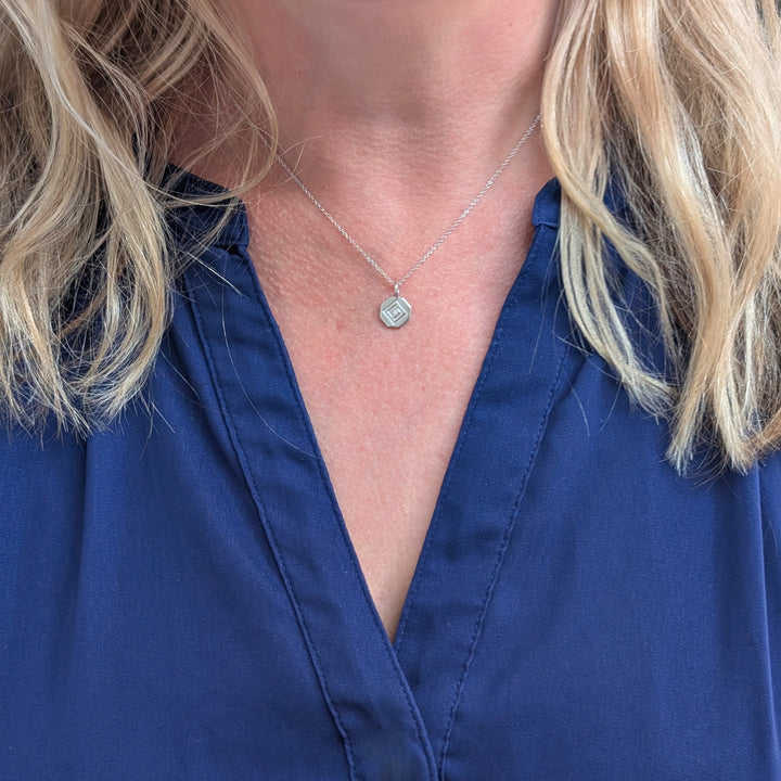 Sterling silver necklace with Lapis London disc charm pendant