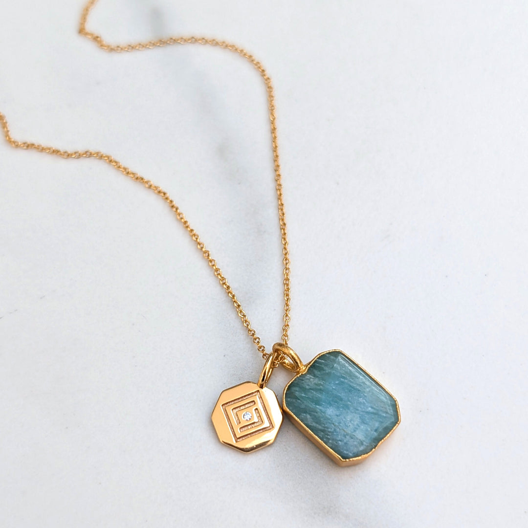 An 18 carat gold plated rectangular slice pendant with amazonite gemstone pendant necklace