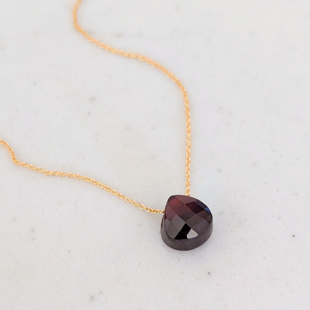 garnet January birthstone necklace on gold chain 