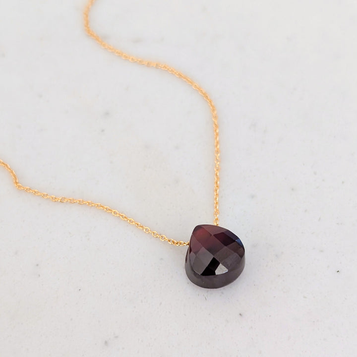 garnet January birthstone necklace on gold chain 