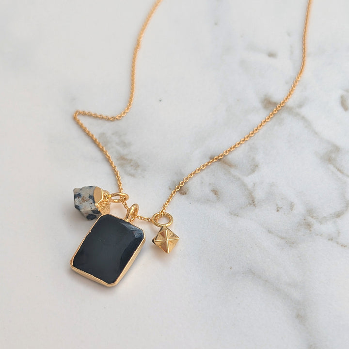 black onyx, dalmatian jasper and tetrahedron star pendant charm necklace