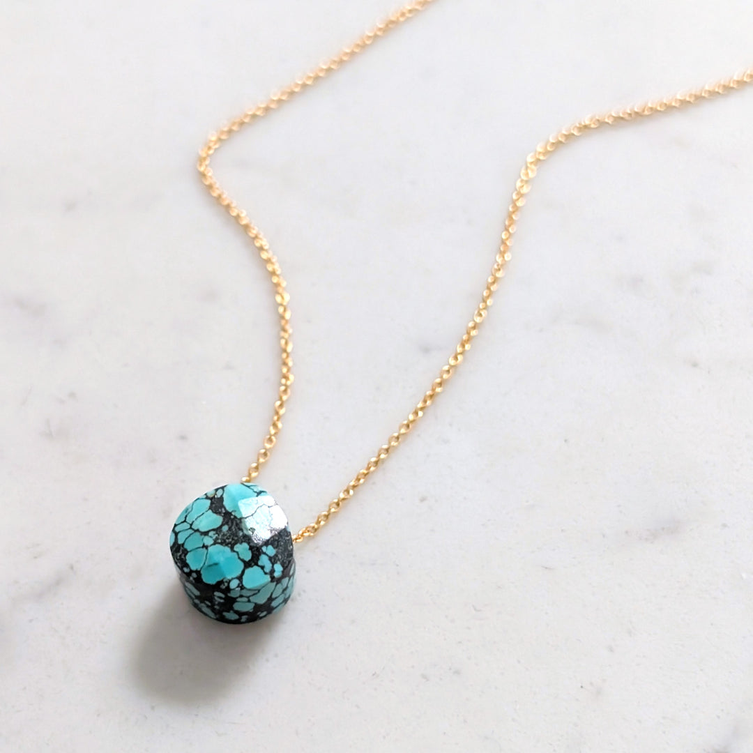gold chain with turquoise faceted December birthstone pendant
