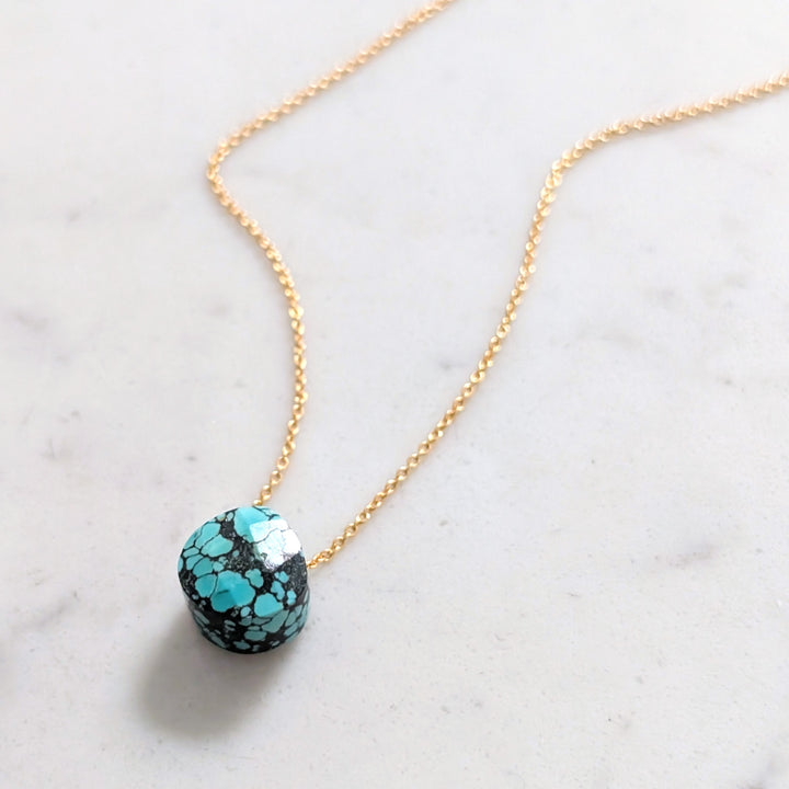 gold chain with turquoise faceted December birthstone pendant