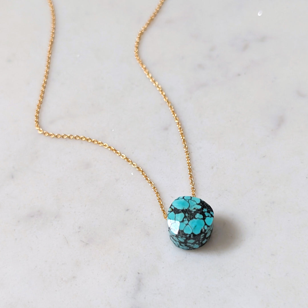 gold chain with turquoise faceted December birthstone pendant