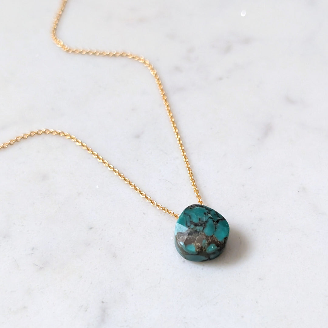 gold chain with turquoise faceted December birthstone pendant