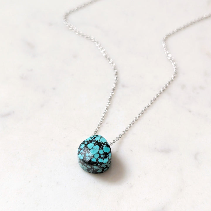 silver necklace with turquoise faceted December birthstone pendant 