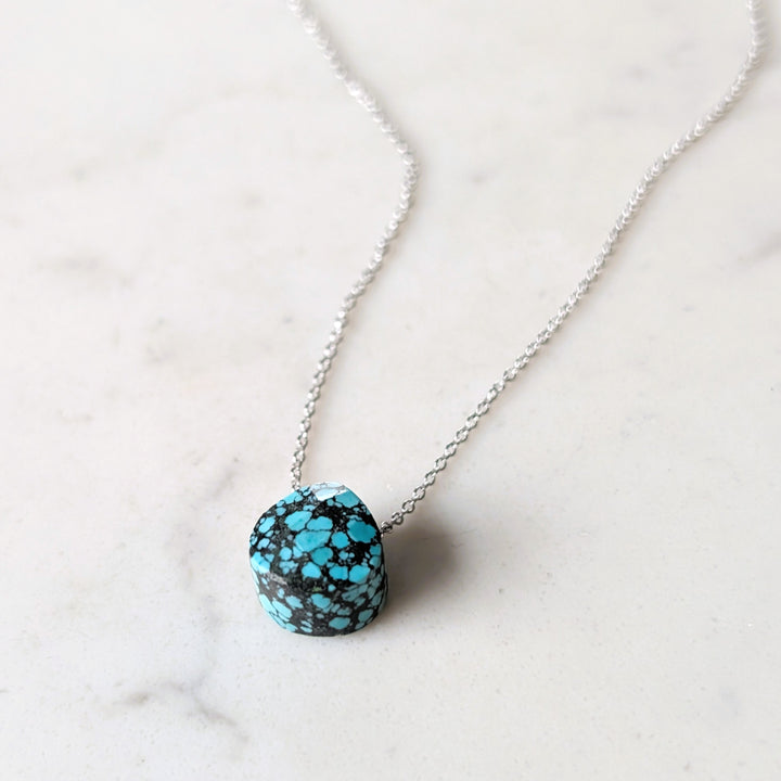 silver necklace with turquoise faceted December birthstone pendant 