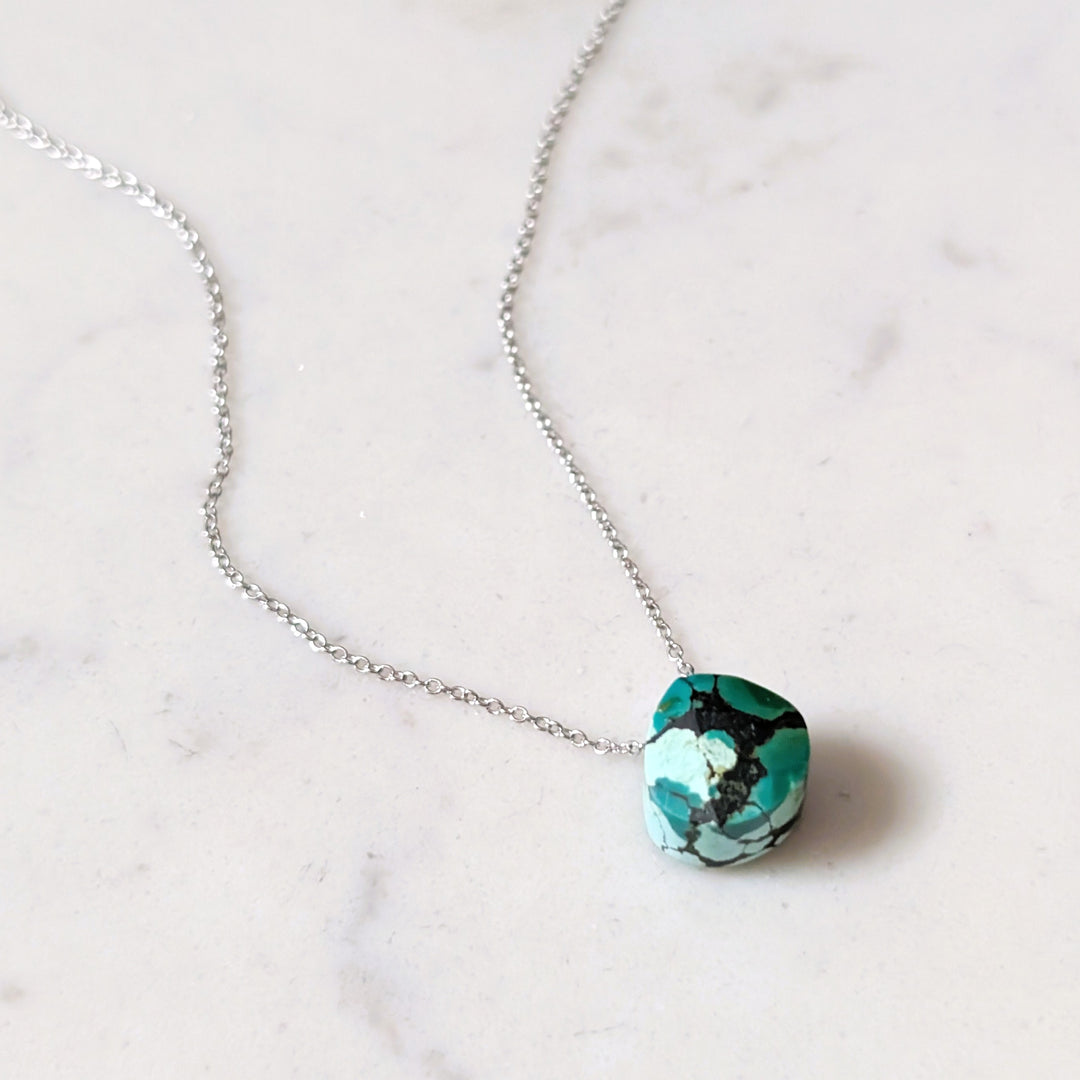 silver necklace with turquoise faceted December birthstone pendant 