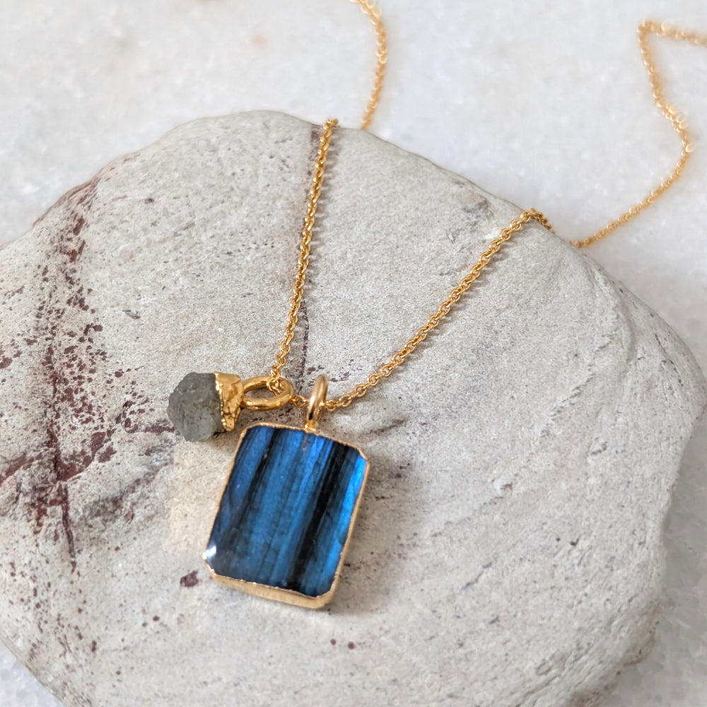 Gold necklace with a blue labradorite pendant