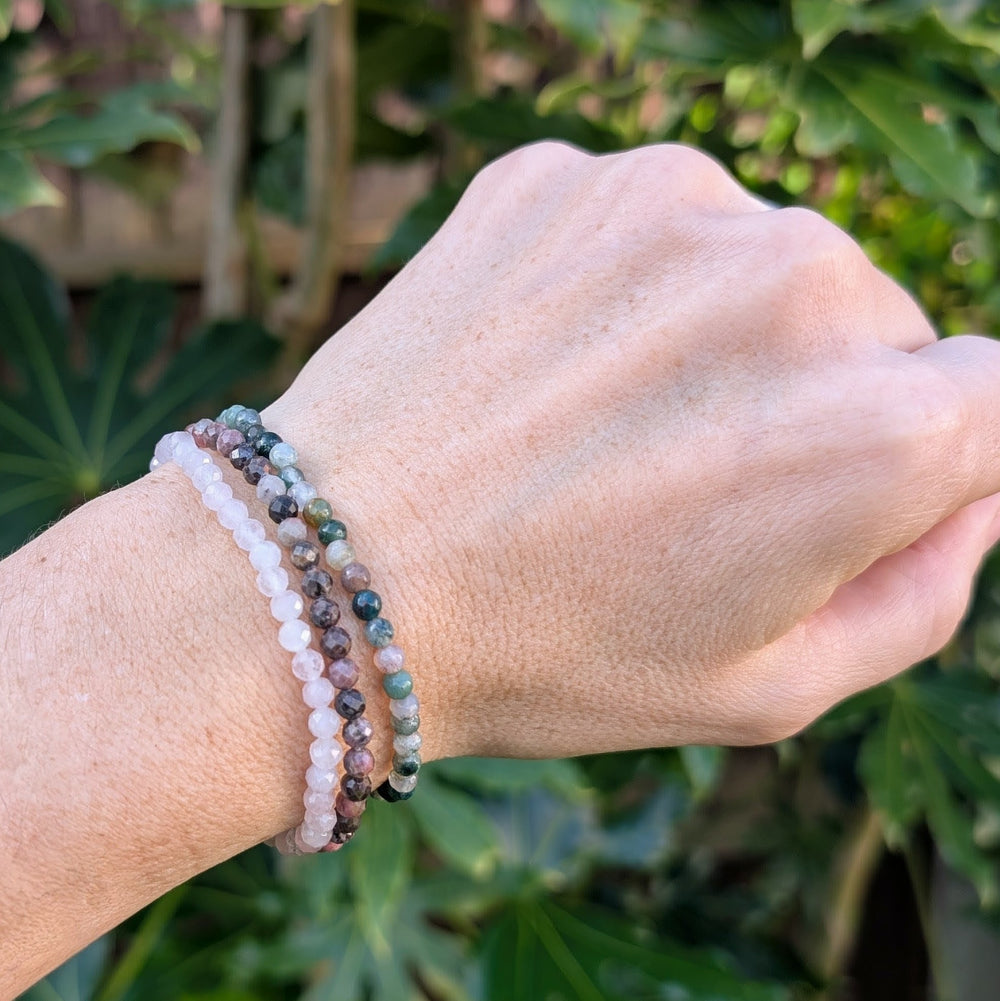 Taurus zodiac gemstone bracelet set comprising rose quartz, rhodonite and moss agate beaded bracelets