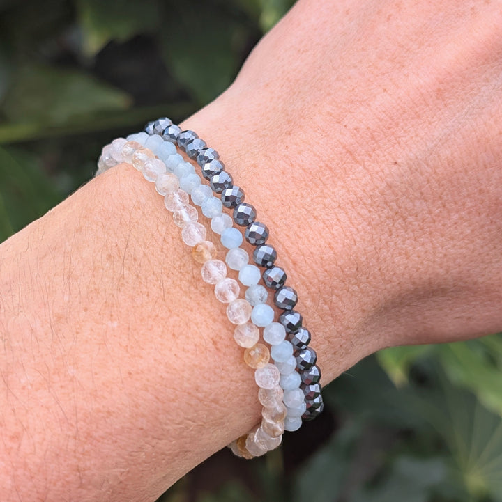 Aries zodiac gemstone bracelet set comprising hematite, citrine and aquamarine beaded bracelets