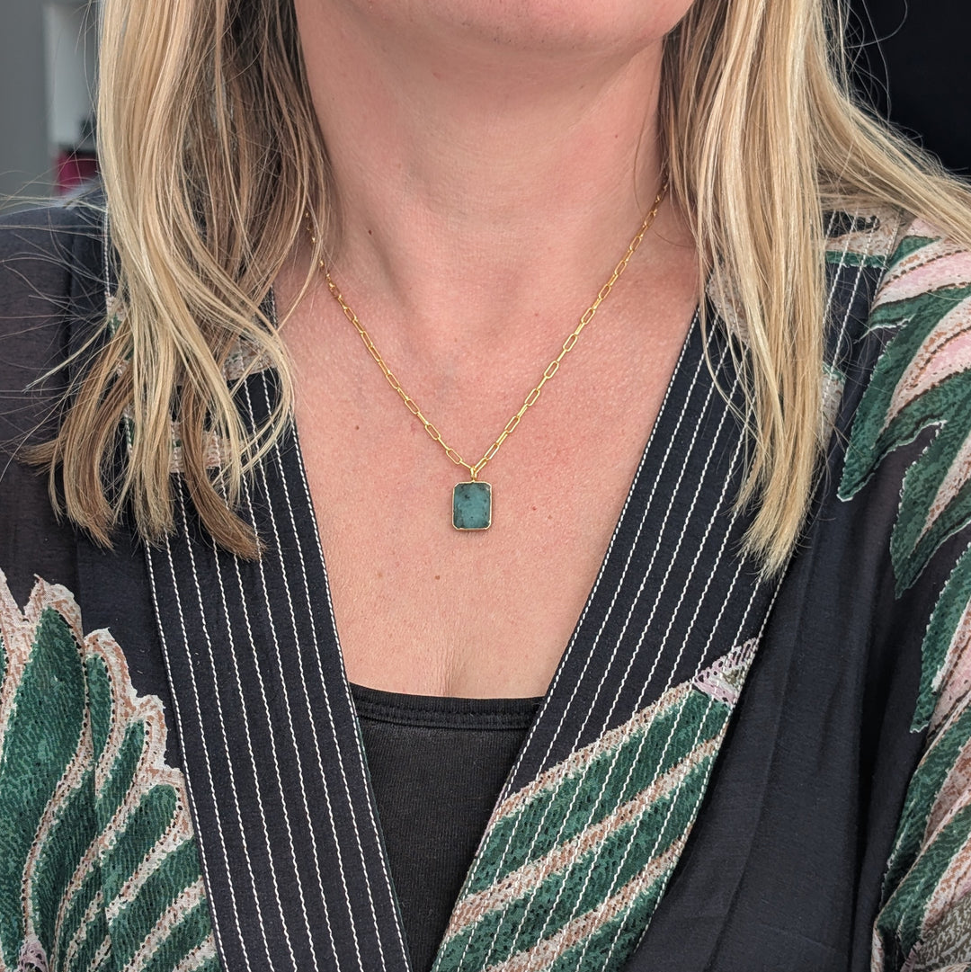 Gold rectangular Emerald pendant necklace with paperclip chain