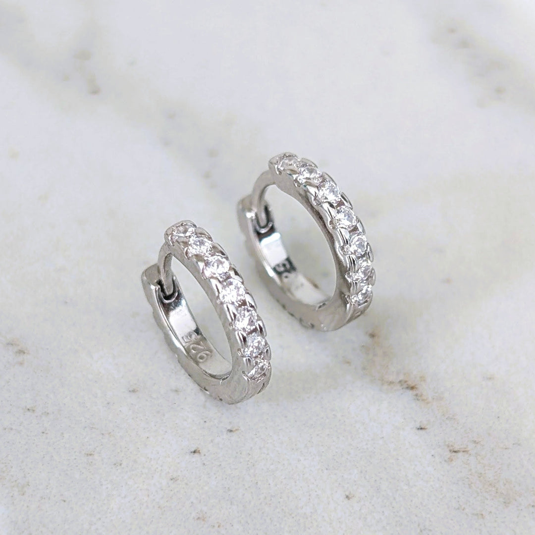 Pair of sterling silver zircon huggie hoop earrings 