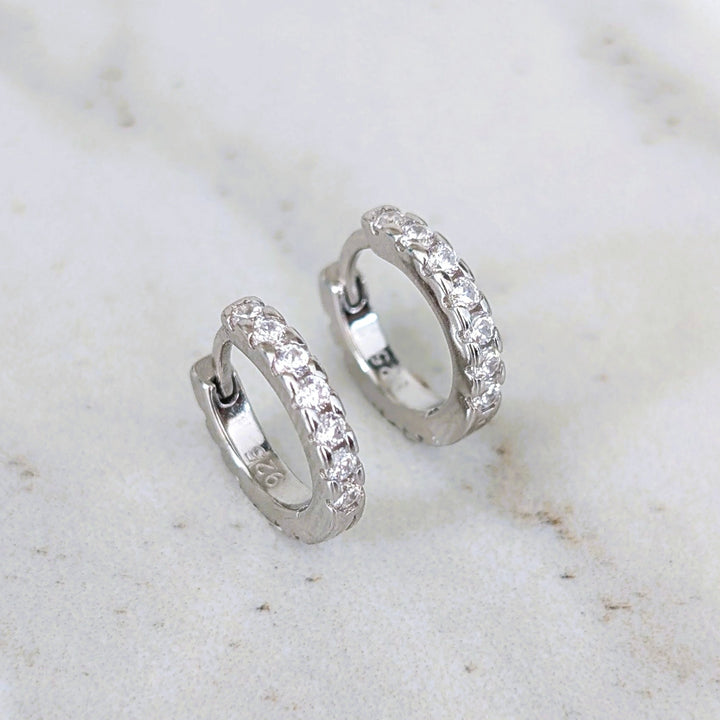 Pair of sterling silver zircon huggie hoop earrings 
