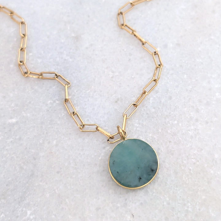 emerald circular pendant on paperclip chain