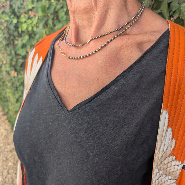 pyrite skinny gemstone necklace layered with lapis lazuli and gold necklace