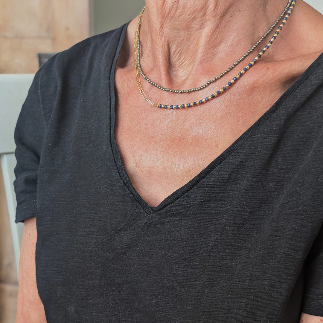 pyrite skinny gemstone necklace layered with lapis lazuli and gold necklace