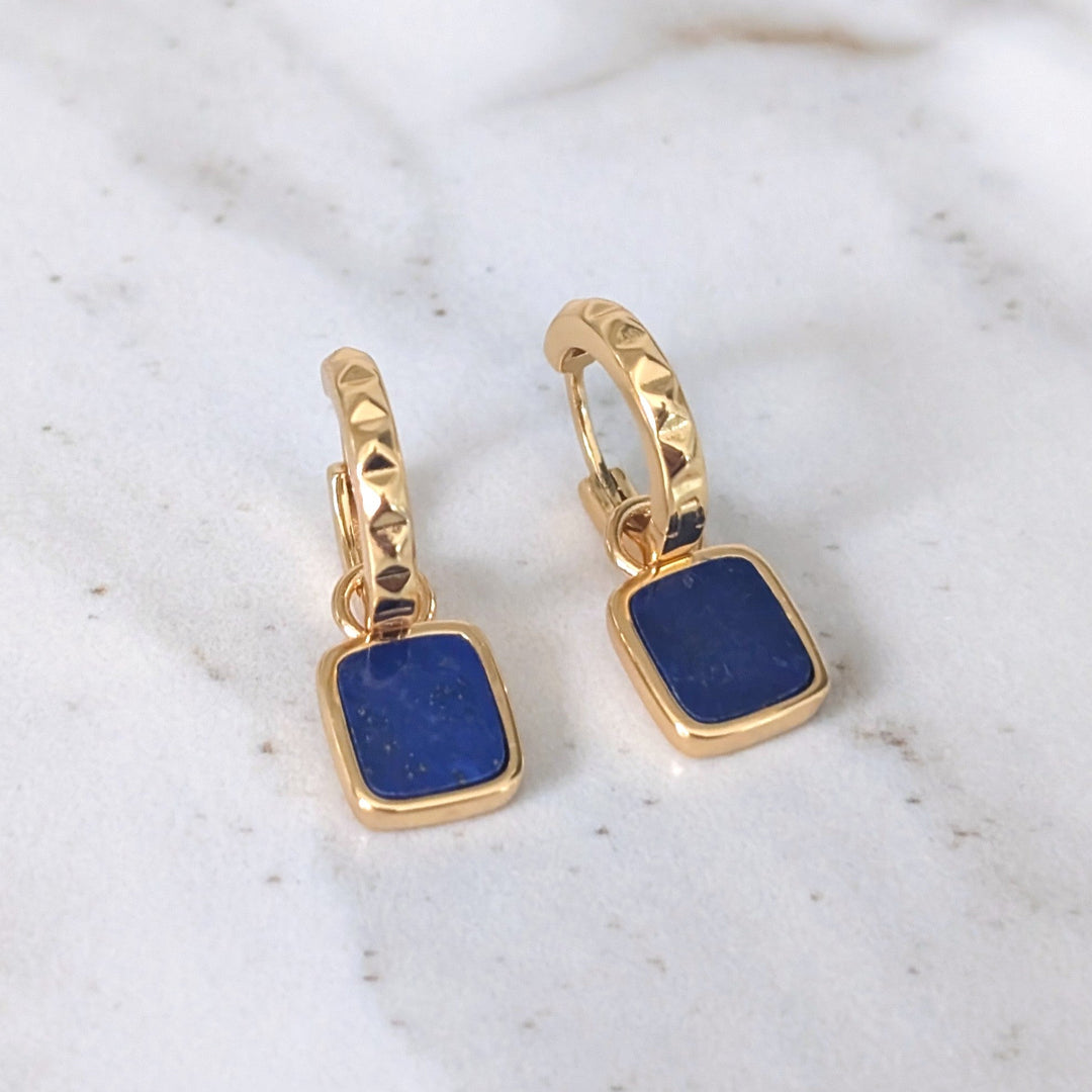A pair of gold lapis lazuli Athena square charm gemstone hoop earrings 