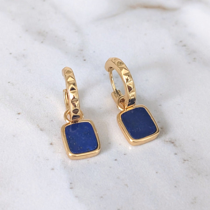 A pair of gold lapis lazuli Athena square charm gemstone hoop earrings 
