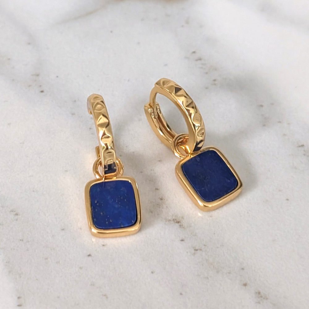 A pair of gold lapis lazuli square charm gemstone hoop earrings 