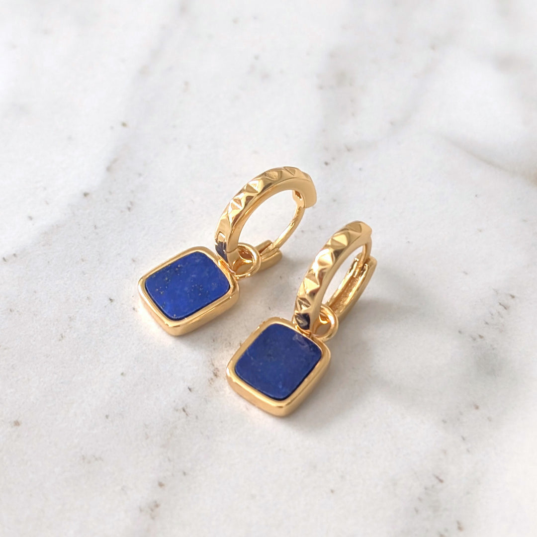 A pair of gold lapis lazuli Athena square charm gemstone hoop earrings 