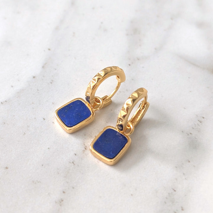 A pair of gold lapis lazuli Athena square charm gemstone hoop earrings 