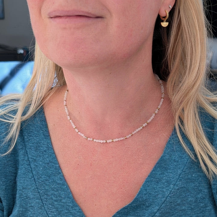 clear quartz gemstone and gold bead necklace 