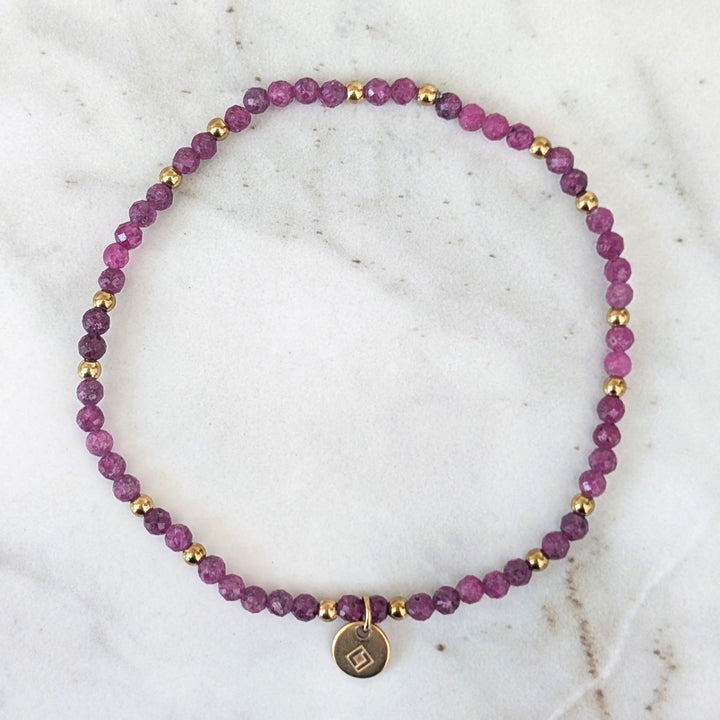Ruby July birthstone gemstone and gold bead bracelet 