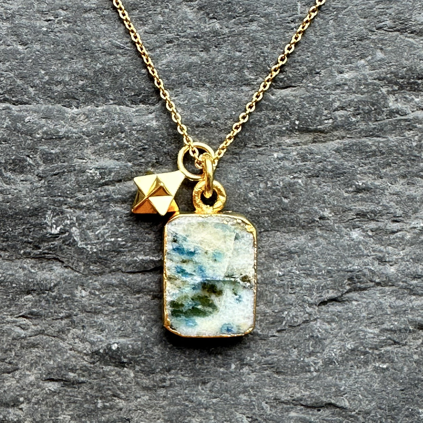 K2 gemstone necklace with tetrahedron charm