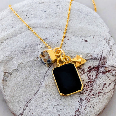 Gold plated black onyx, dalmatian jasper and tetrahedron charm pendant necklace